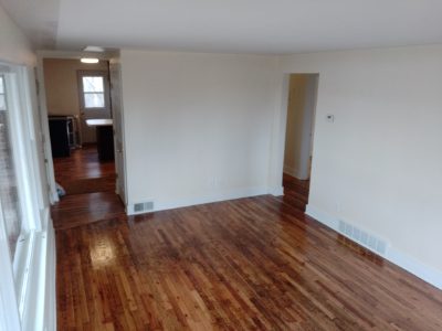 Living room with refinished hardwood floors