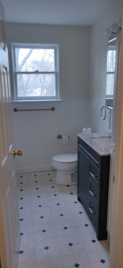 Full bathroom with tiled floor