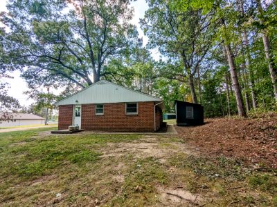 Back of the house and rear lawn