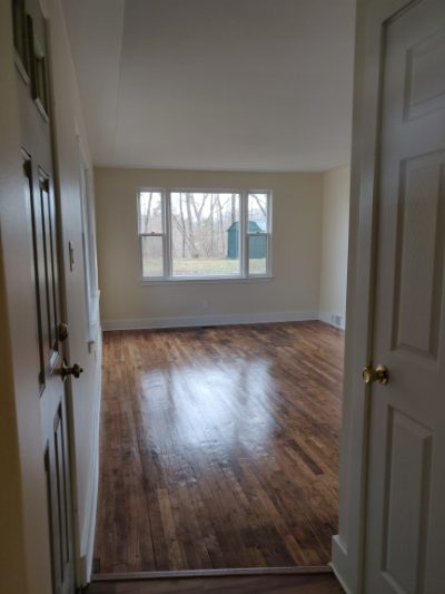 Bedroom with closet and window